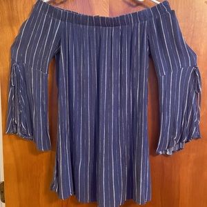 Very cute denim blue, pin striped, off-the-shoulder blouse.